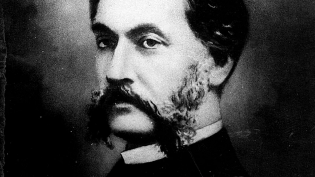 photo en noir et blanc d'augustin leprince un homme blanc avec une moustache taillée et garnie remontant sur ses joues et des sourcils broussailleux