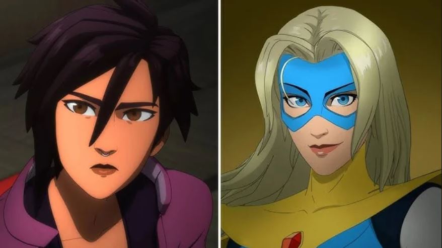 Deux femmes. Invisigal est brune avec un piercing dans le nez et une veste rose, style vaguement punk, gothique. Aurore est blonde avec un masque bleu, les yeux bleus et un costume doré, bleu et blanc où brille un diamant rouge.